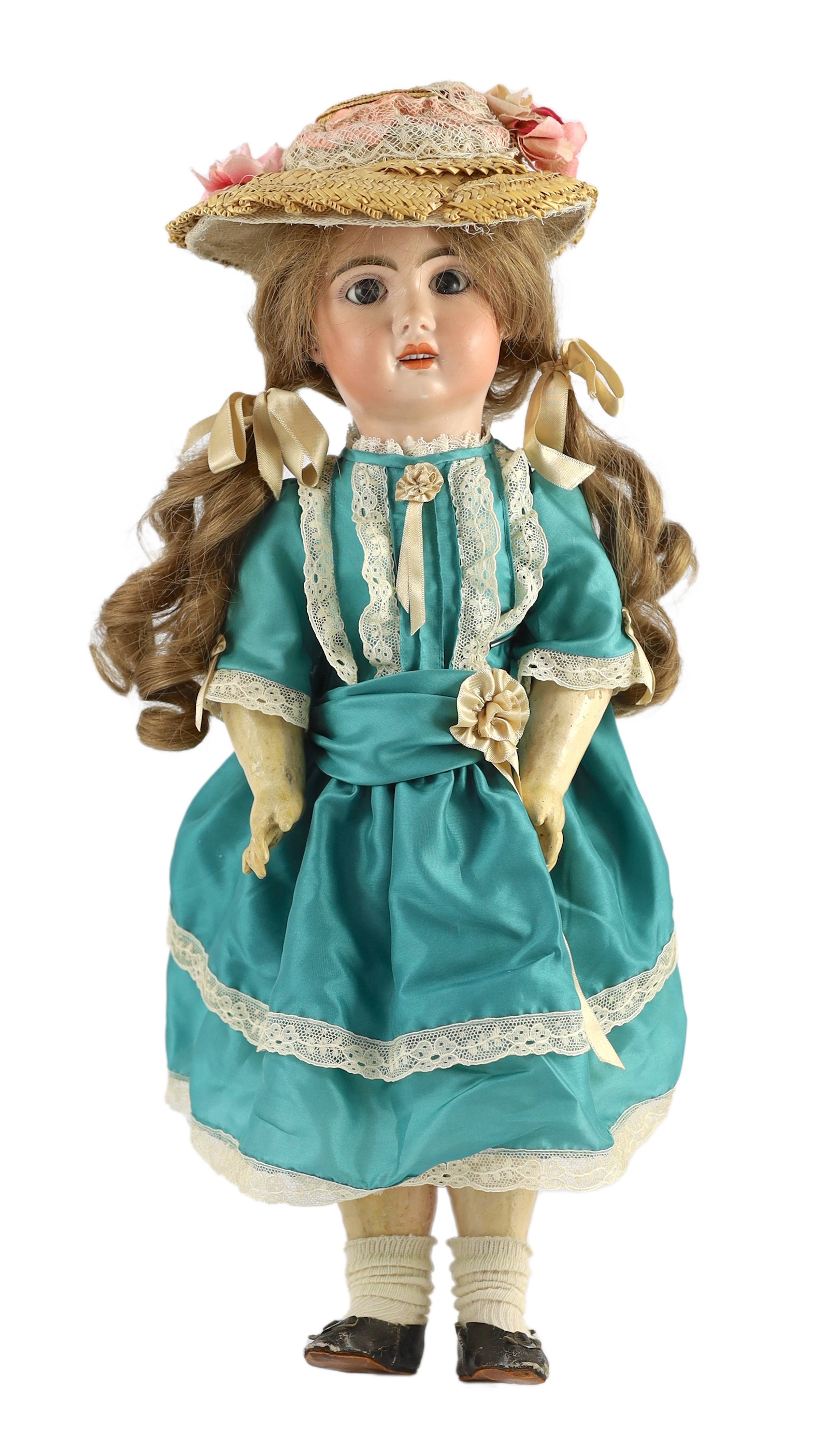 A bisque fashion doll, French, circa 1900, 20in.